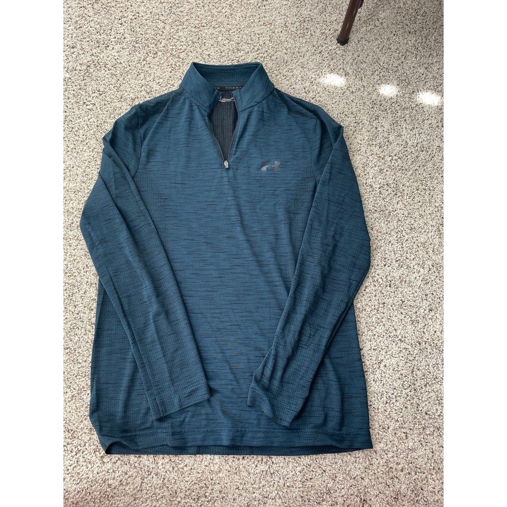 Underarmour long sleeves blue shirt. Worn just a few times. Thin material.
